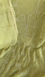 Motifs across the body of the lime green kurta