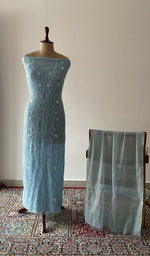 The set on the mannequin with its dupatta beside it