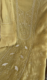 Motifs across the body of the yellow kurta