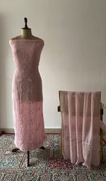 The set on the mannequin with its dupatta beside it