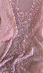 Motifs across the body of the pink kurta