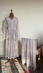 The set on the mannequin with its dupatta beside it