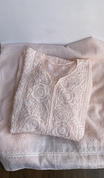 Second folded view of the peach pink kurta piece