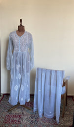The set on the mannequin with its dupatta beside it