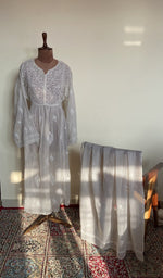 The set on the mannequin with its dupatta beside it
