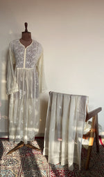 The set on the mannequin with its dupatta beside it