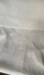 Hem and border of the white dupatta