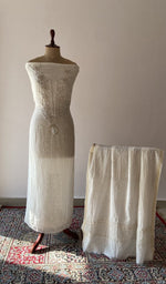 White pure mul chanderi chikankari suit set on the mannequin with its dupatta