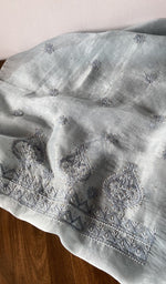 Hem and border of the grey dupatta