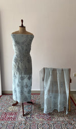 Grey pure organza silk chikankari suit set on the mannequin with its dupatta