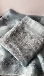 Folded kurta piece and dupatta, chikankari along the hem