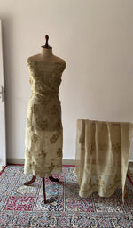 Beige pure organza silk chikankari suit set on the mannequin with its dupatta