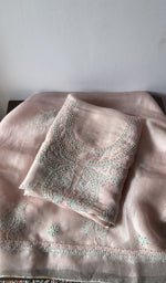 Folded peach pure organza silk kurta piece with chikankari on the panel