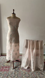 Peach pure organza silk chikankari suit set on the mannequin with its dupatta