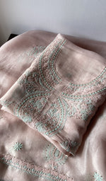 Folded kurta piece and dupatta, chikankari along the hem