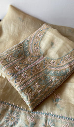 Folded kurta piece and dupatta, chikankari along the hem