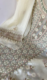 Hem and border of the off white dupatta