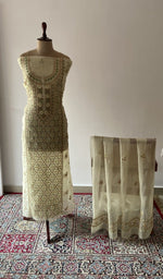 Off white pure organza silk chikankari suit set on the mannequin with its dupatta