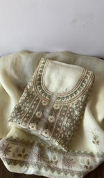Folded kurta piece and dupatta, chikankari along the hem