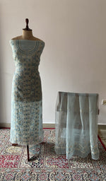 Blue pure organza silk chikankari suit set on the mannequin with its dupatta