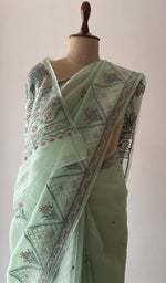 Extremely fine ek and do taar multicoloured chikankari across the body of the saree