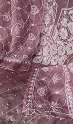Hem and border of the purple dupatta