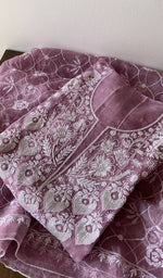 Folded kurta piece and dupatta, chikankari along the hem