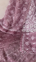 Beads, sequins, cutdana and allover resham aari along the panel