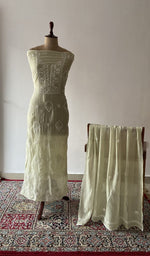 Green pure mul chanderi chikankari suit set on the mannequin with its dupatta
