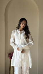 White co-ord set, worn by the model