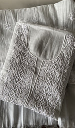 Folded white tissue chanderi kurta, front view