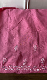 The rose pink kurta, spread out flat
