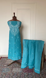 Turquoise cotton set on the mannequin with its dupatta