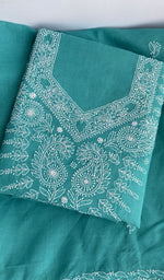Folded turquoise cotton kurta, second view