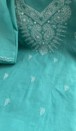 Fine chikankari on the turquoise cotton