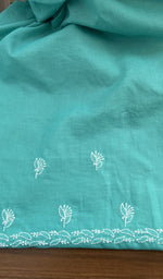 Close view of the turquoise kurta fabric