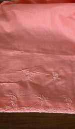 Hand embroidery on coral cotton