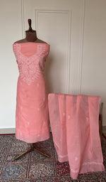 Coral cotton set on the mannequin with its dupatta