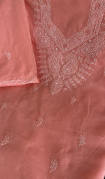 Stitch detail on the coral cotton kurta