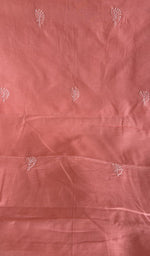 Close view of the coral kurta fabric