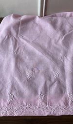 The baby pink kurta, spread out flat