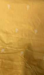 Hand embroidery on mustard yellow cotton