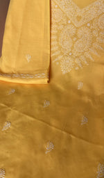 Fine chikankari on the mustard yellow cotton