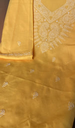 Stitch detail on the mustard yellow cotton kurta