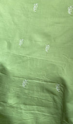 Hand embroidery on pista green cotton