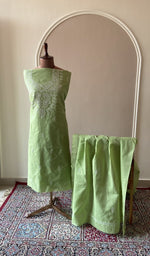 Pista green cotton set on the mannequin with its dupatta