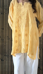 Yellow short kurti on the model