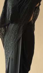 Black saree on the mannequin, close view