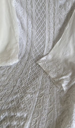 White viscose georgette laid flat on the table