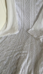 Close view of the white kurta fabric